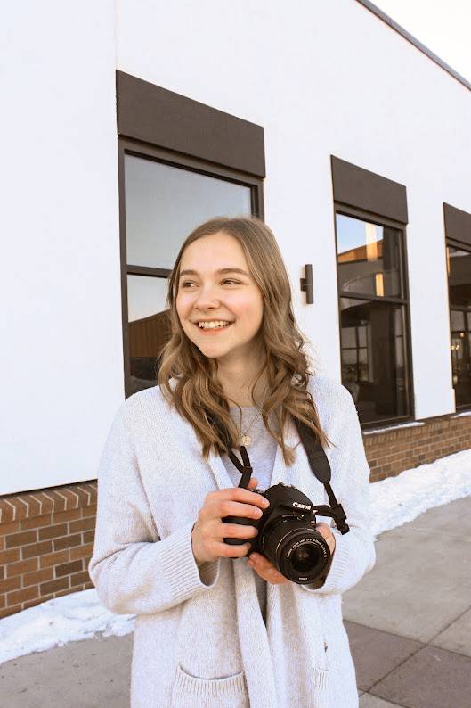 Amber posed with a camera