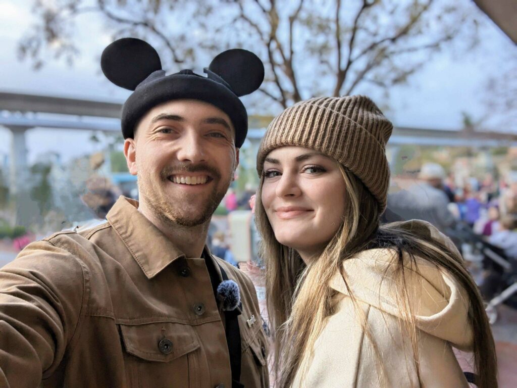 Tera and her husband at a theme park